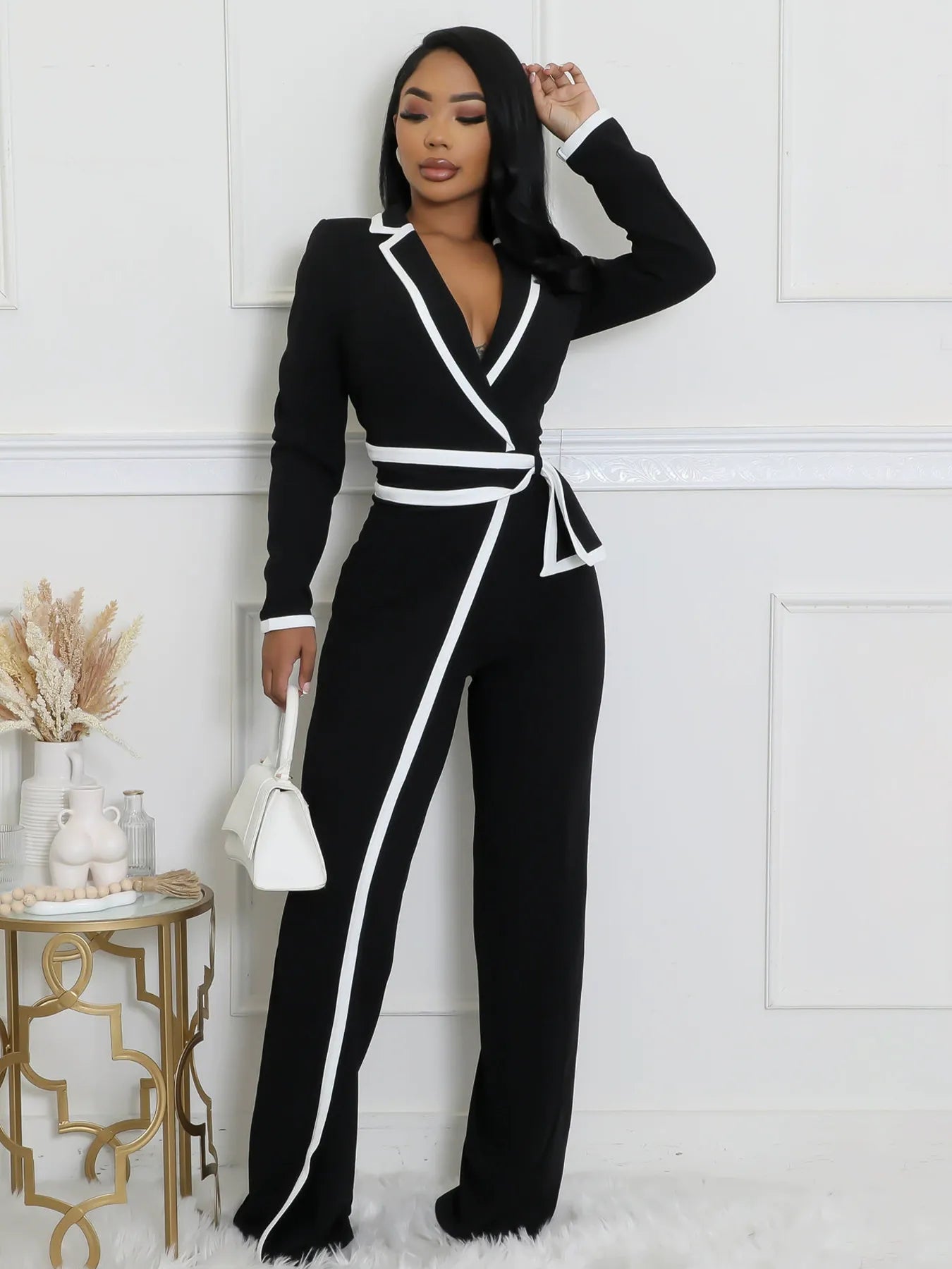 Belted long-sleeved jumpsuit